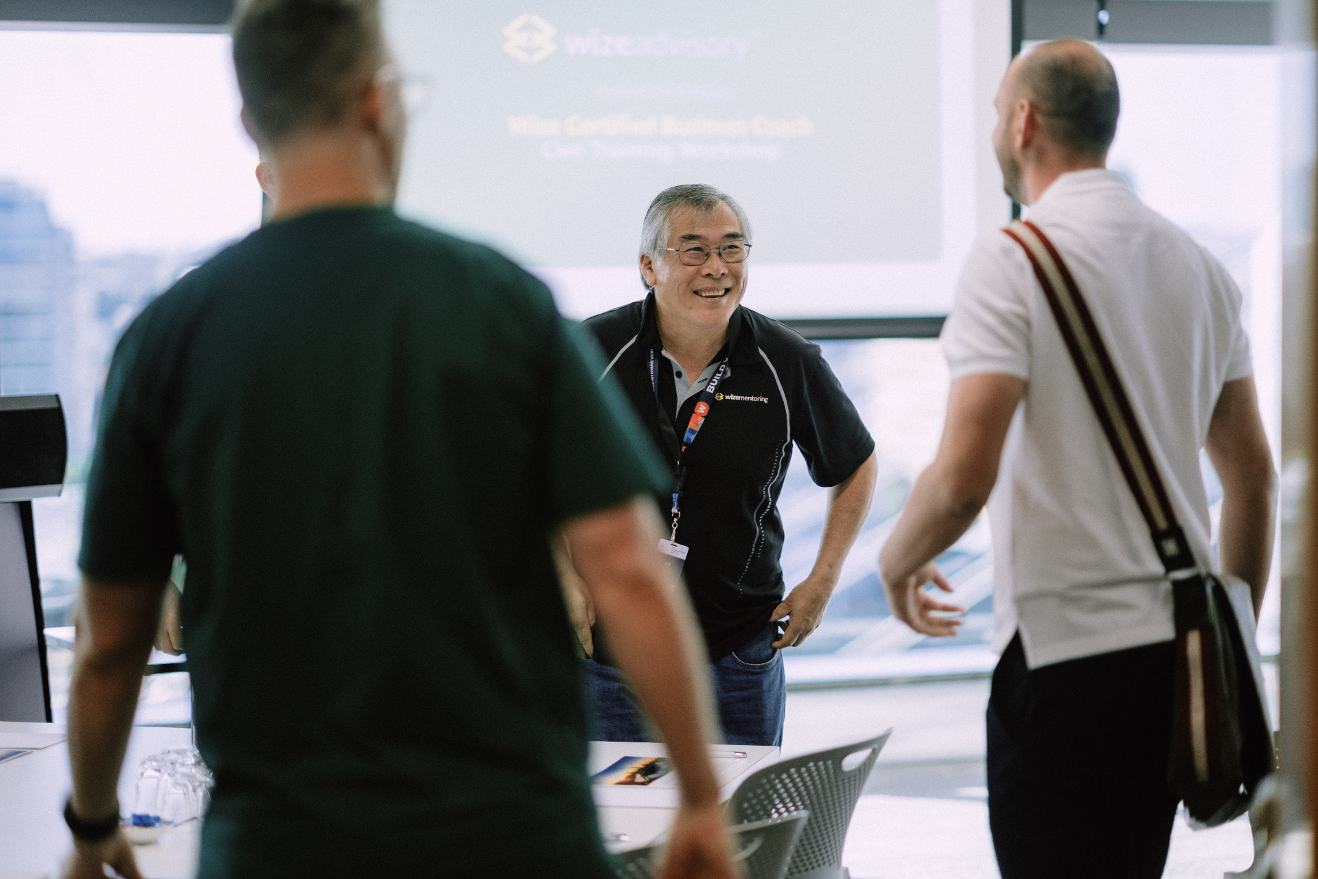 WizeAdvisory members connecting at a live workshop