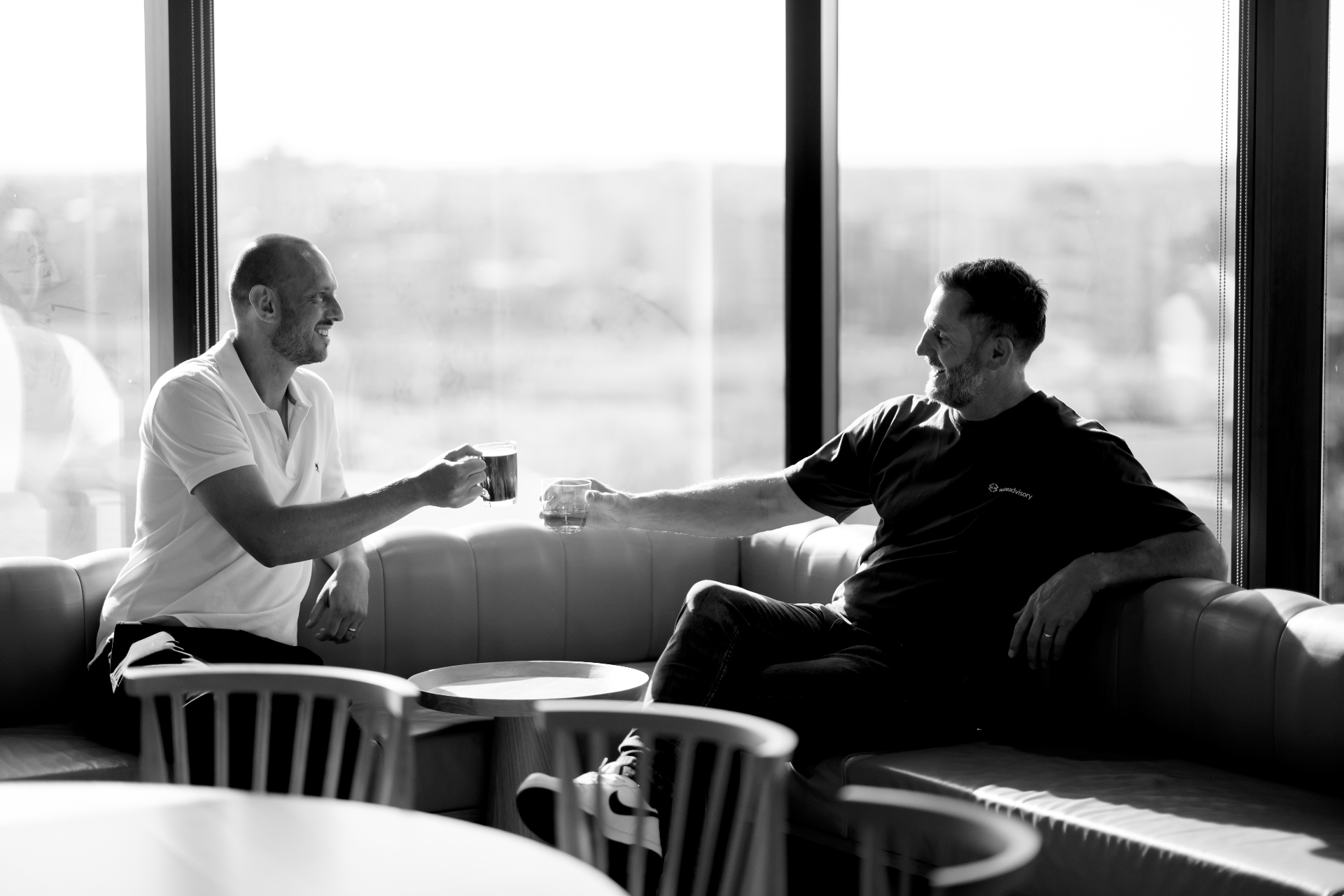 A conversation between attendees in Brisbane
