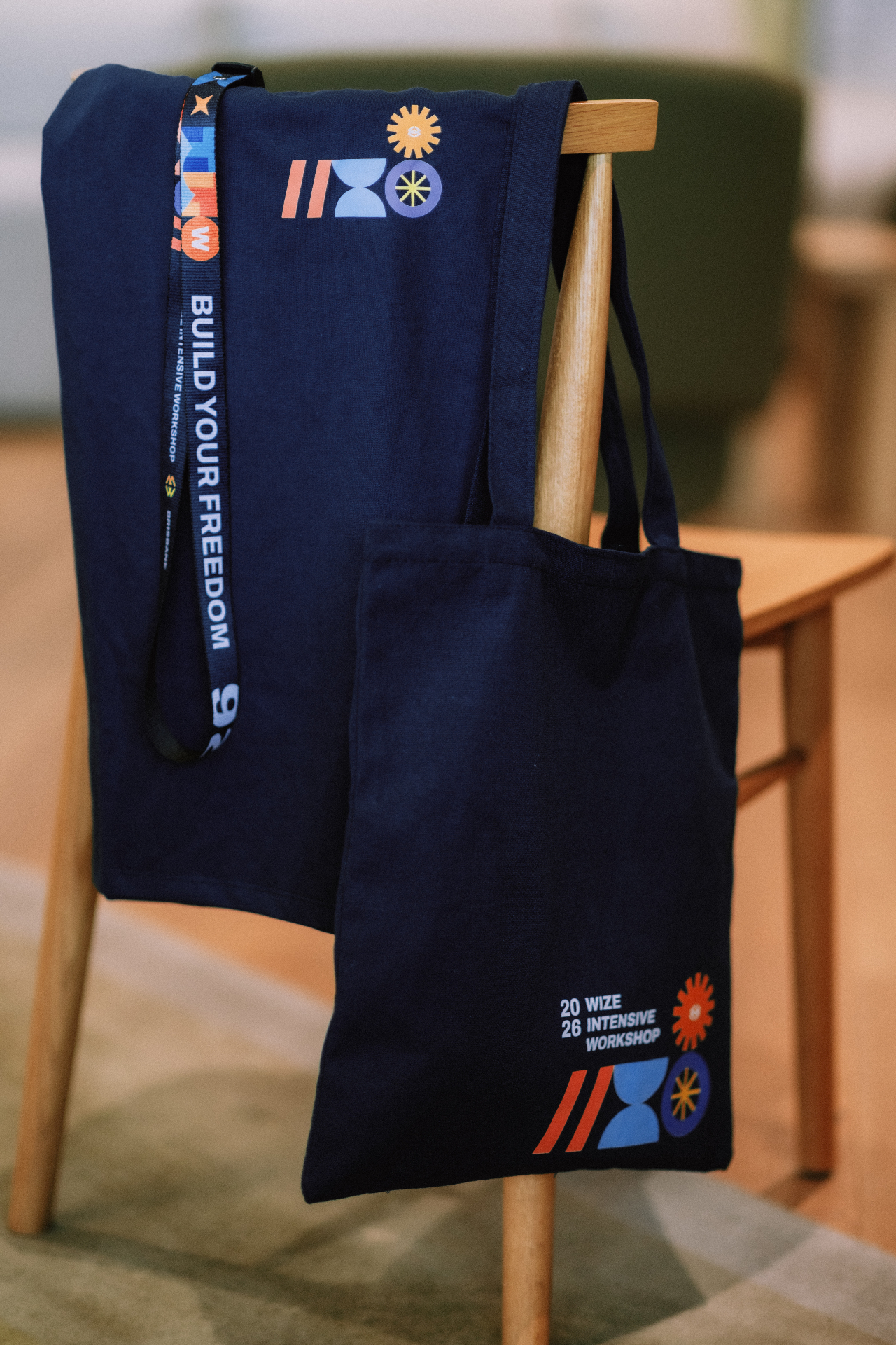 Wize Intensive tote bag and lanyard on display at the event