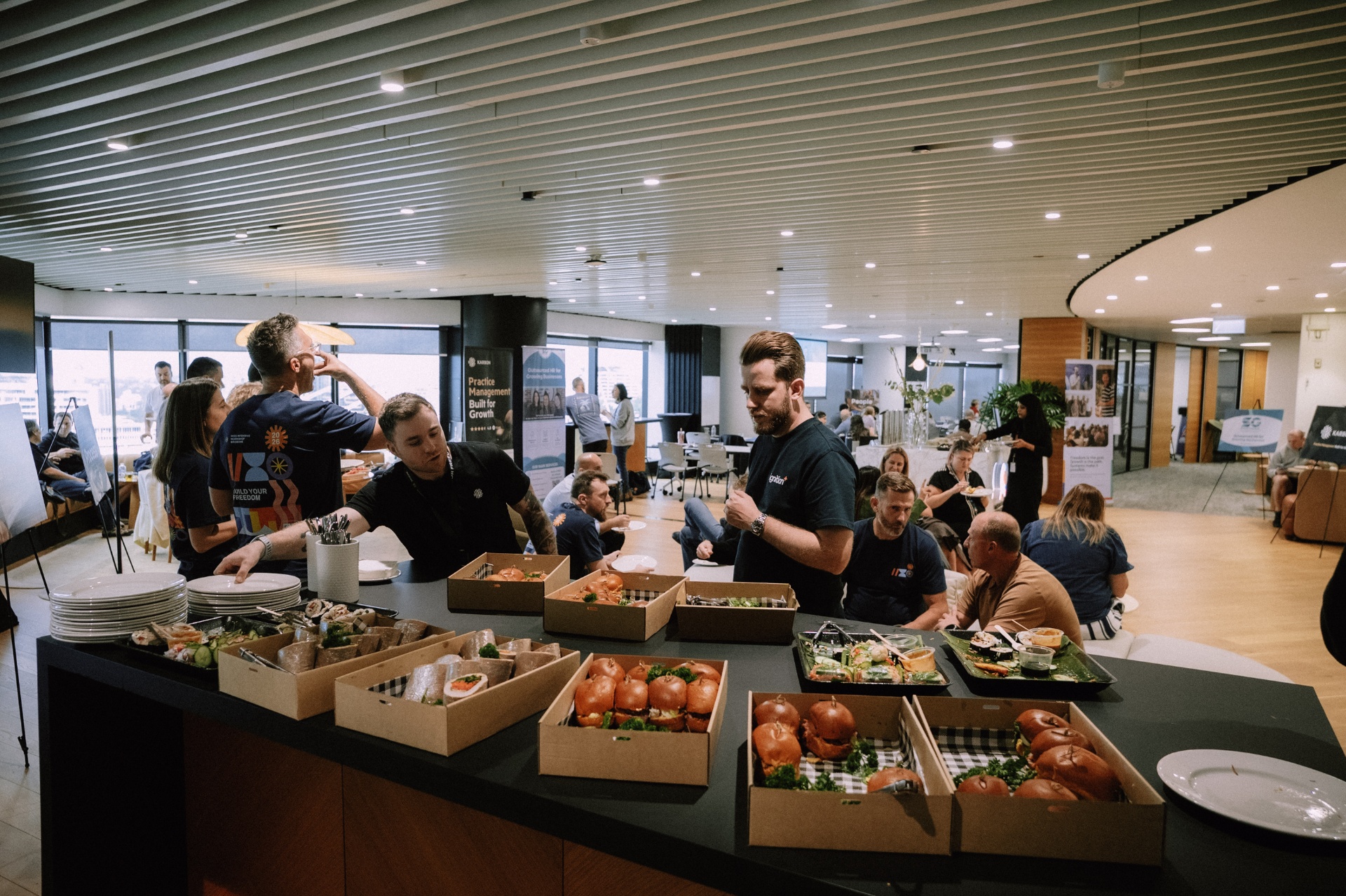 Lunch spread and guests at the Wize Intensive