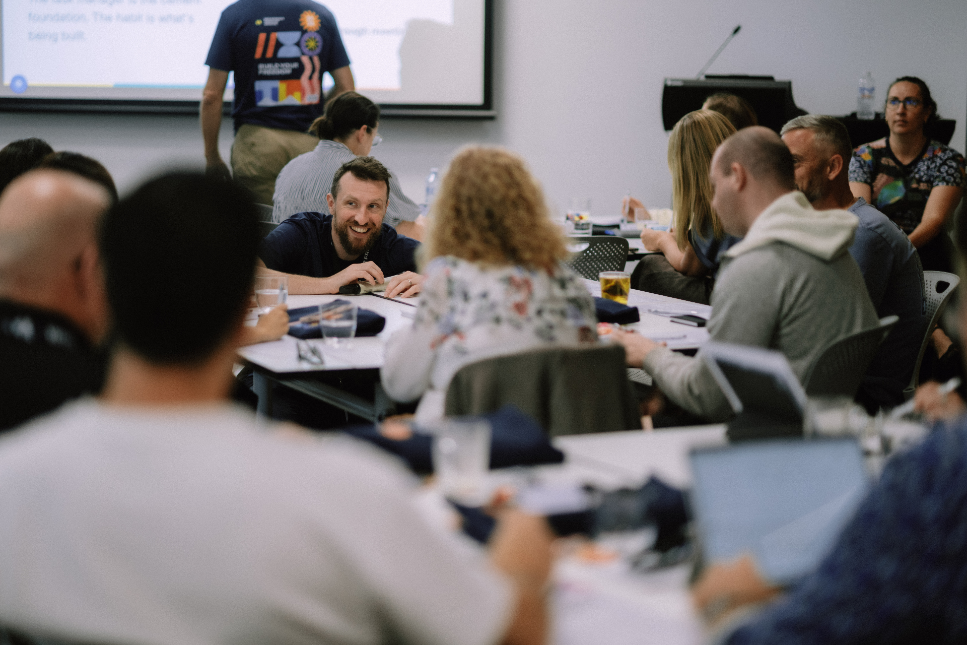 Small-group discussion during Day 1 Wize Intensive