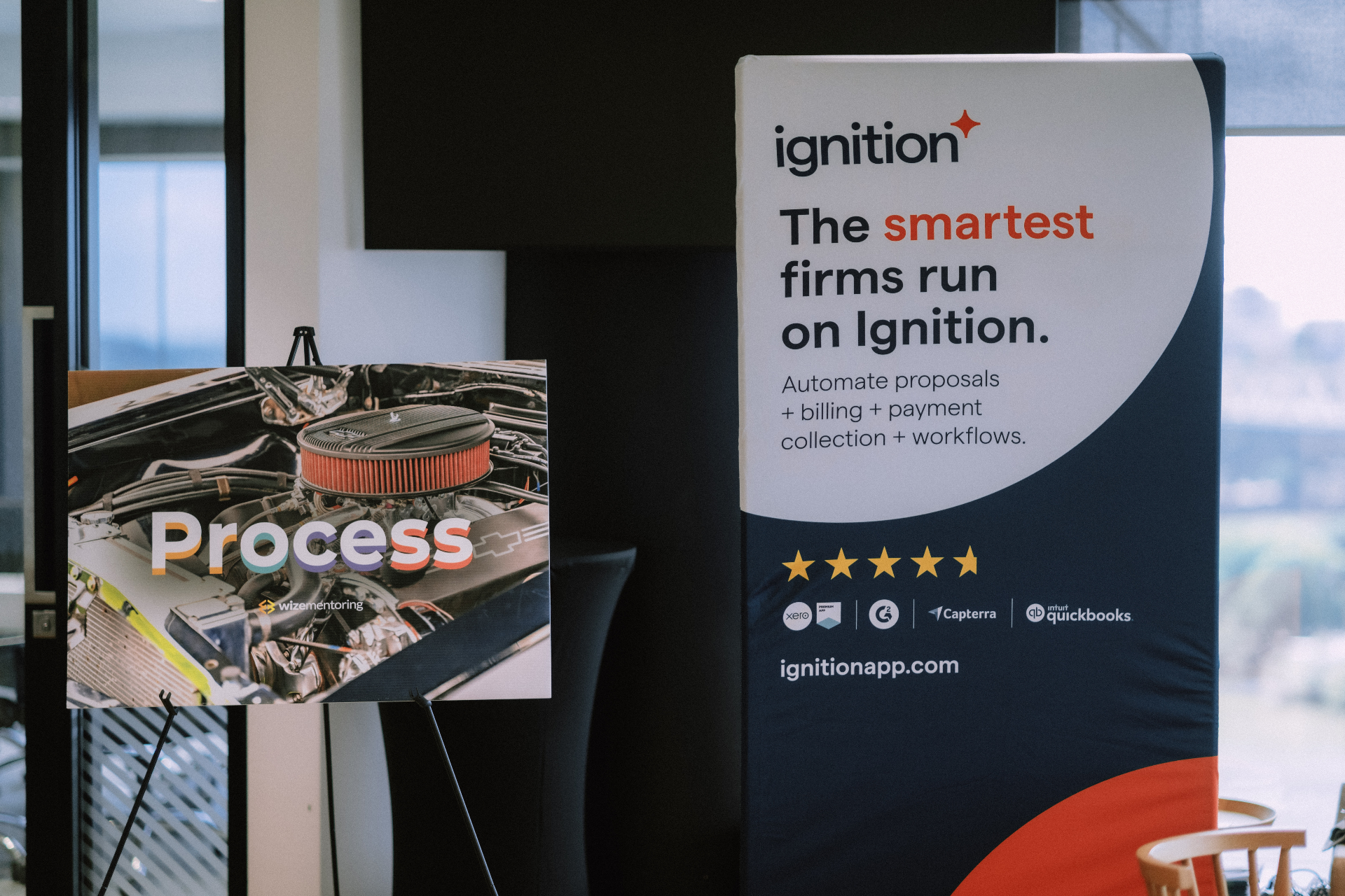 Ignition sponsor display beside WizeMentoring process signage