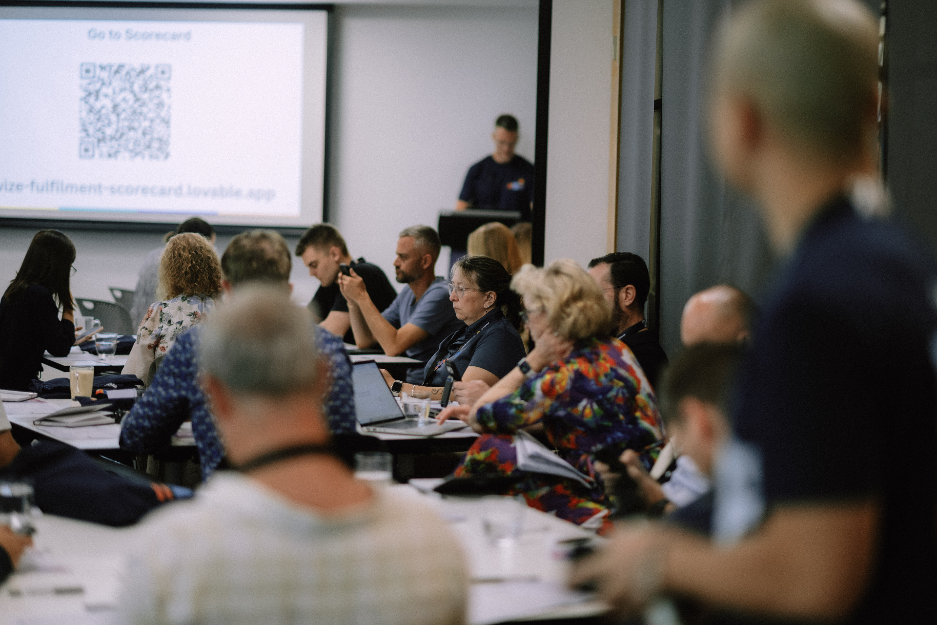 Focused audience view during the workshop presentation